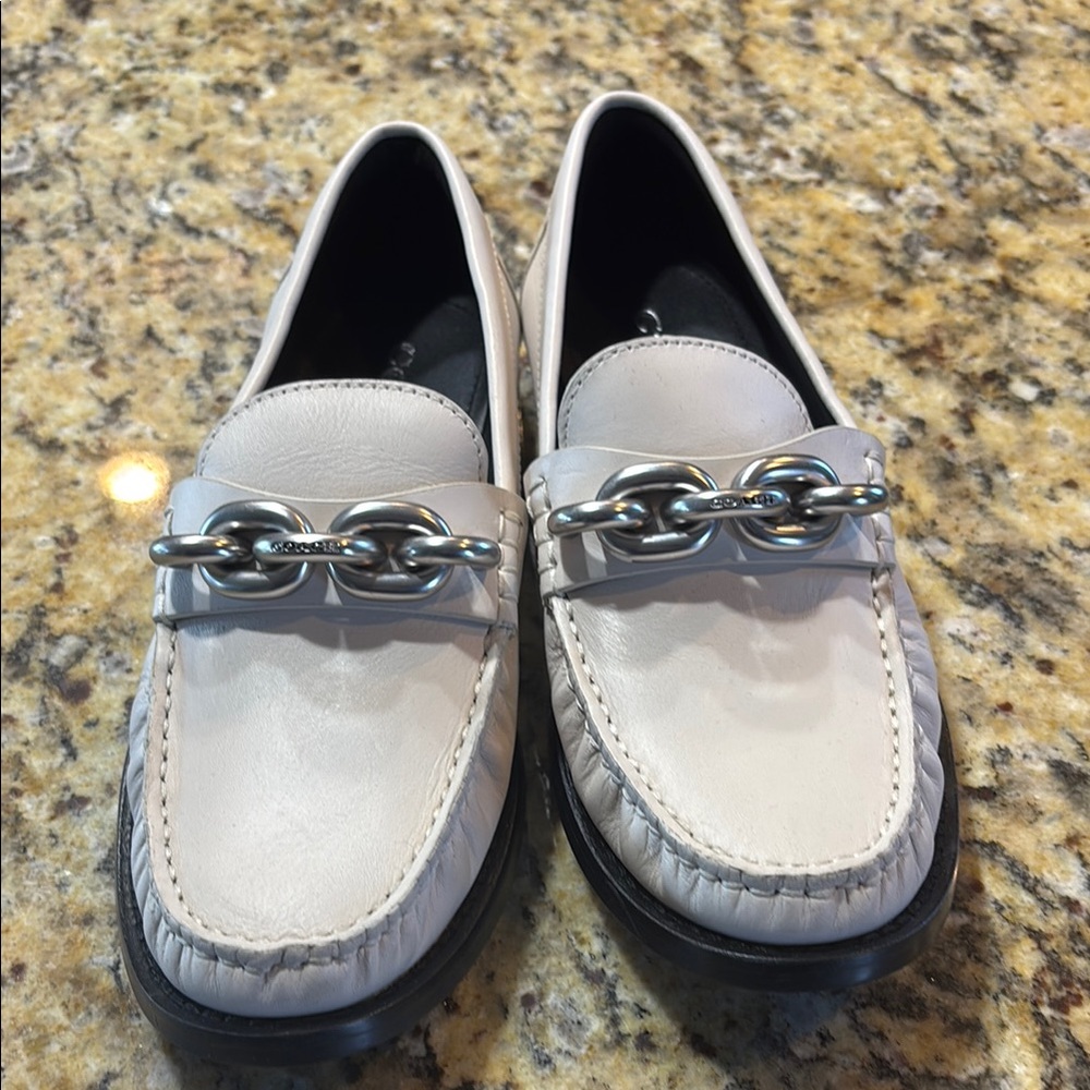 Stylish White Loafers with Silver Chain Accent